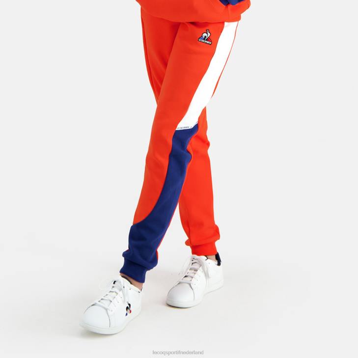 kleding LDBJ642 kinderen Le Coq Sportif broek oranje