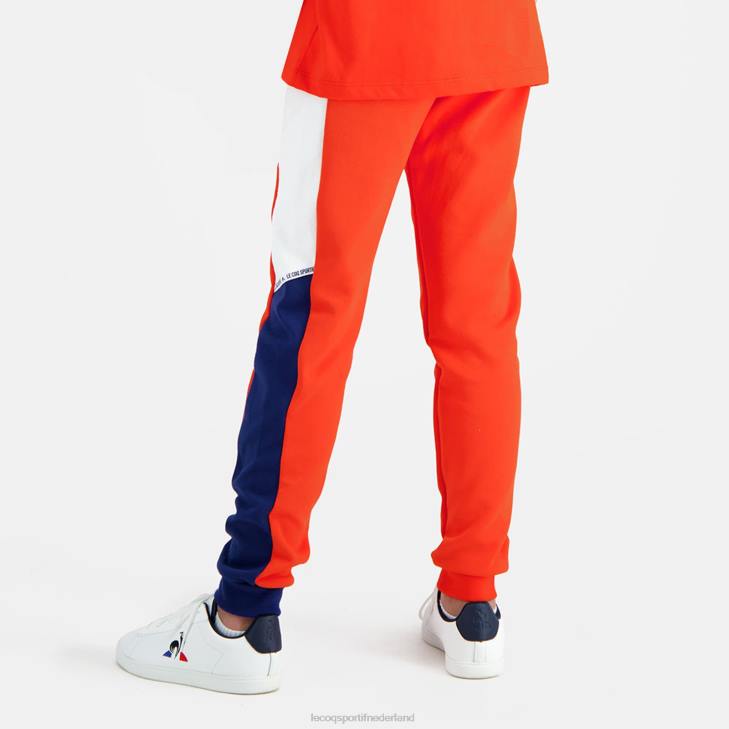 kleding LDBJ642 kinderen Le Coq Sportif broek oranje