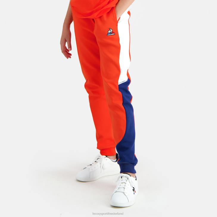 kleding LDBJ642 kinderen Le Coq Sportif broek oranje